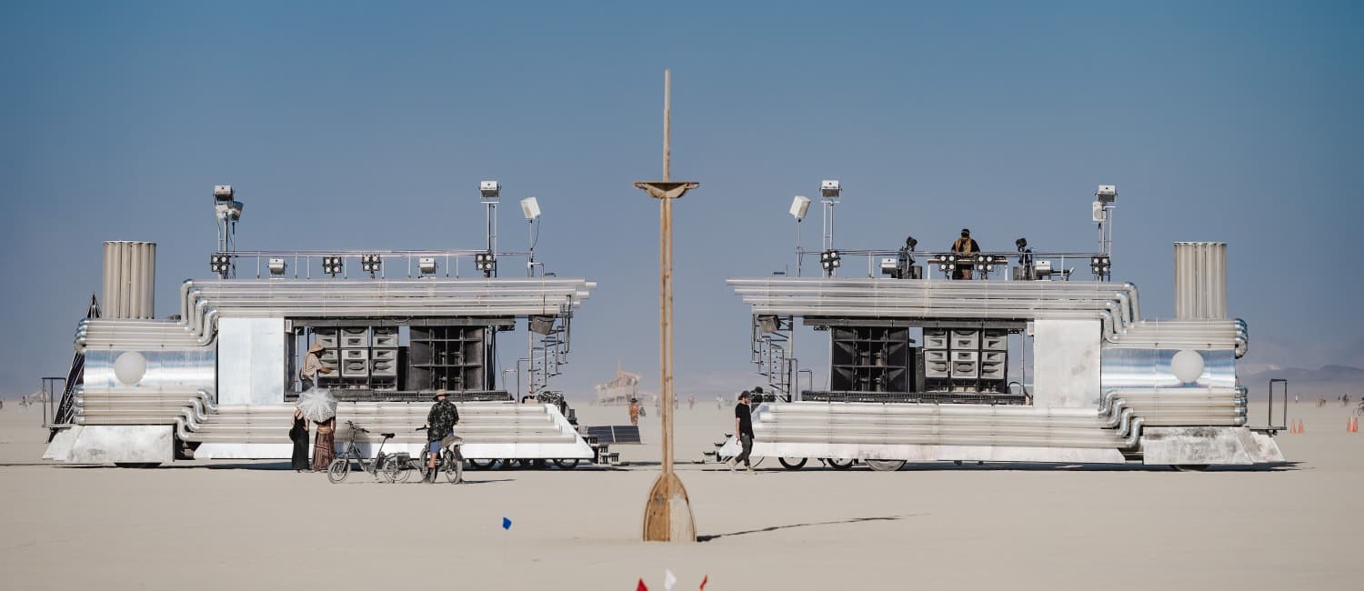 The two BiPolar Express trains facing each other across the open Playa