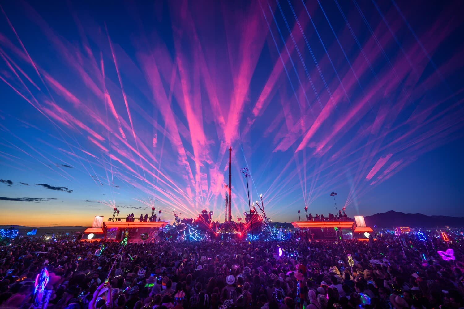 BiPolar Express, Singularity Tree and MAXA joined beneath a wide laser canopy at dusk