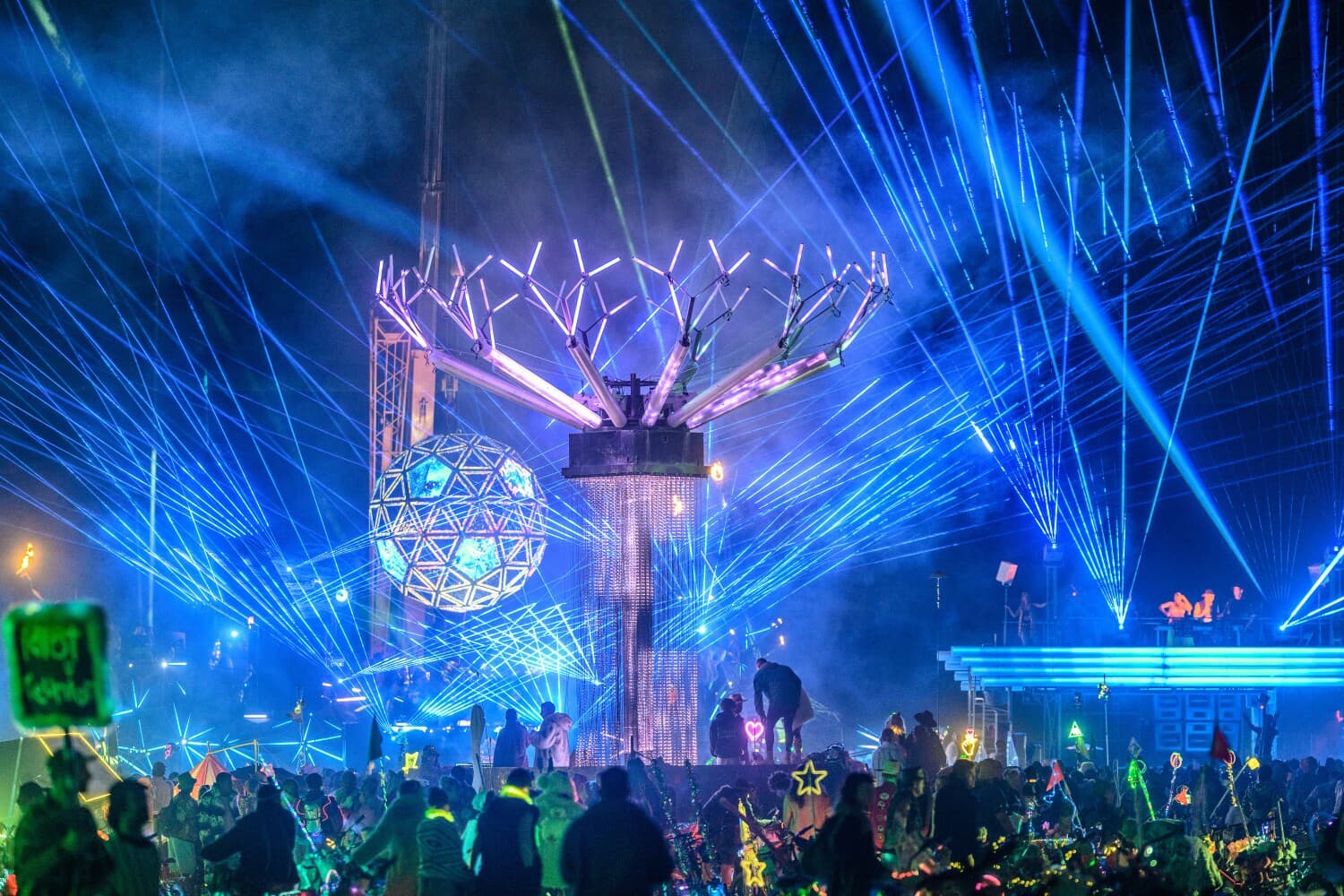 Singularity Tree, BiPolar Express and MAXA surrounded by blue lasers during their Playa linkup